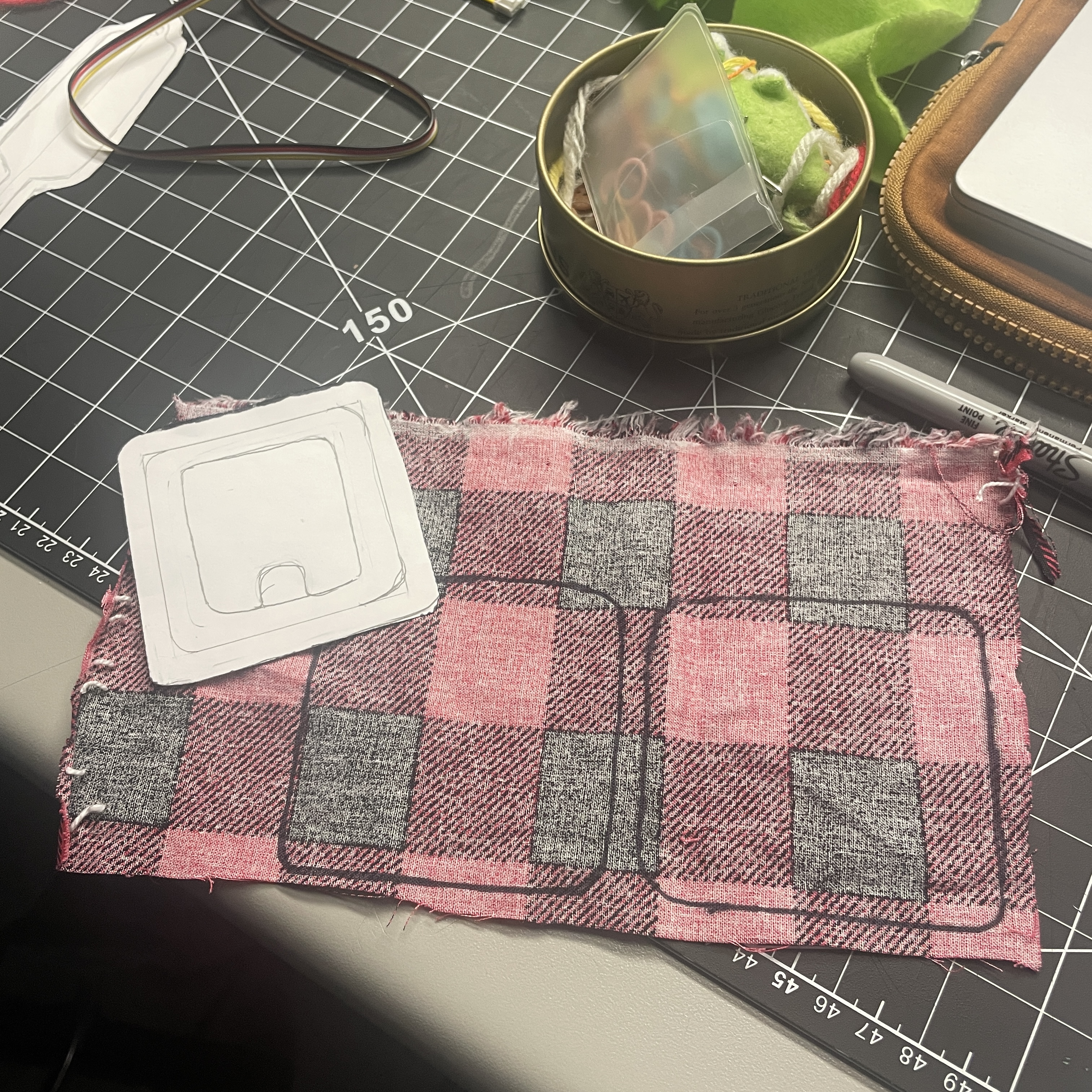 We made paper prototypes to visualize and create measurements for our patch/bracelet prototypes.