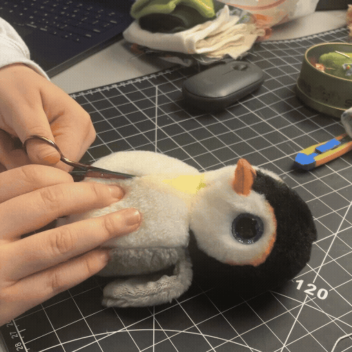 This is a GIF of us opening up Pongo the penguin.